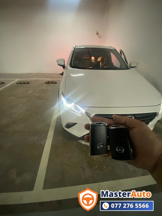 Chìa khóa xe Mazda smart key và remote tại MasterAuto